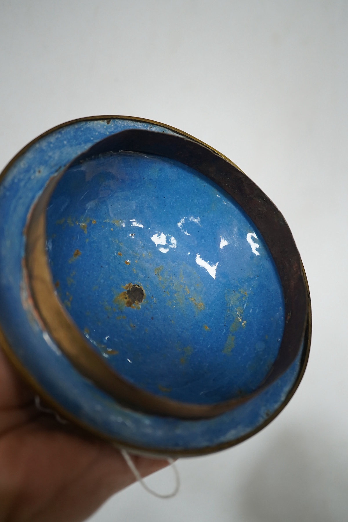 A pair of Chinese champleve enamel floral jars and covers, 22cm high. Condition - good